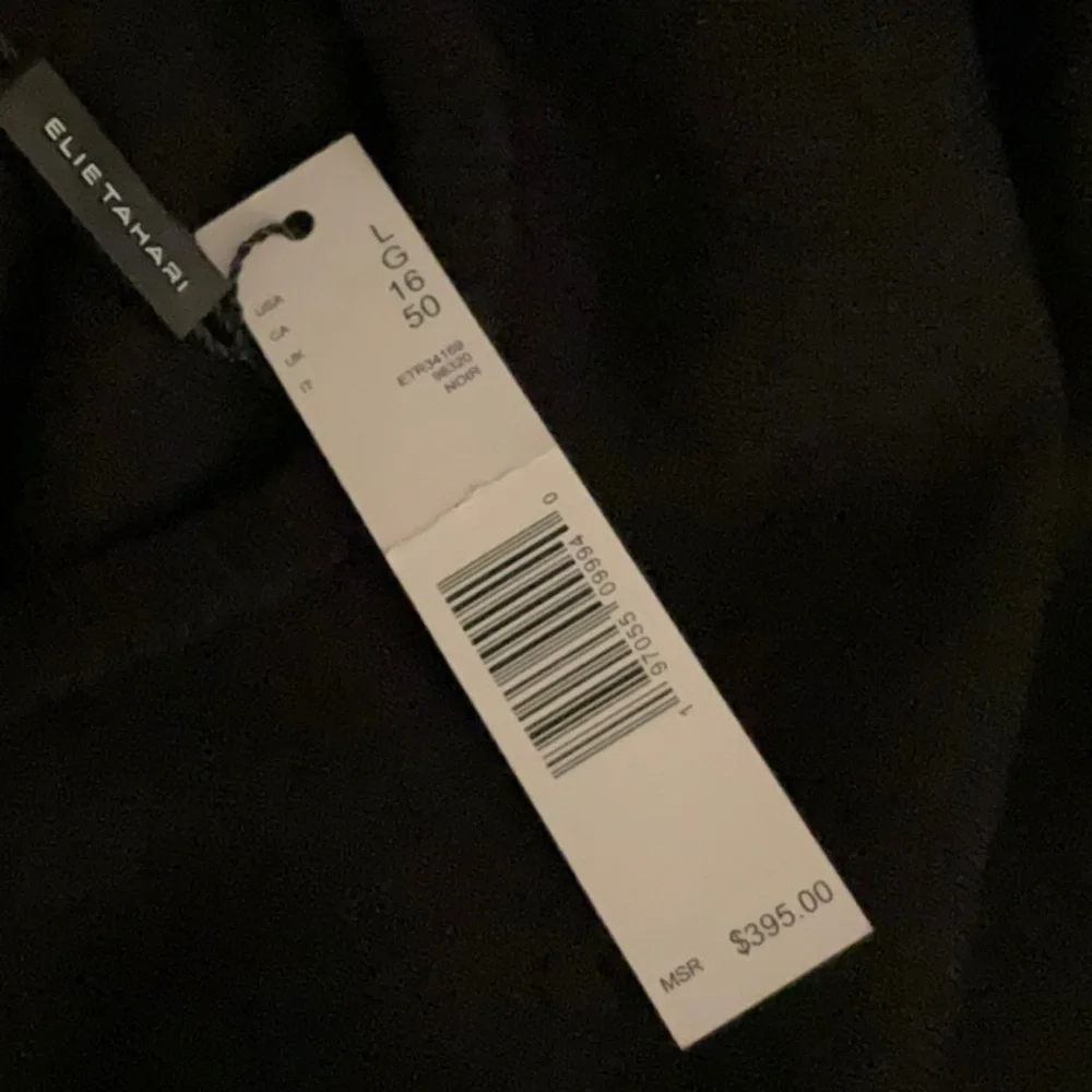 Elie Tahari leather The Amalia Pleated Mixed Media Sweater Dress
Color black - Picture 13 of 13